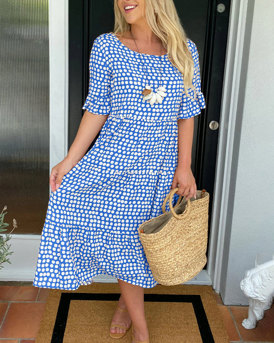 Emma | Vestido Midi de Lunares Chic
